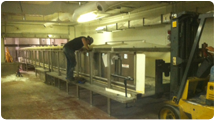 Millwrights installing bakery equipment